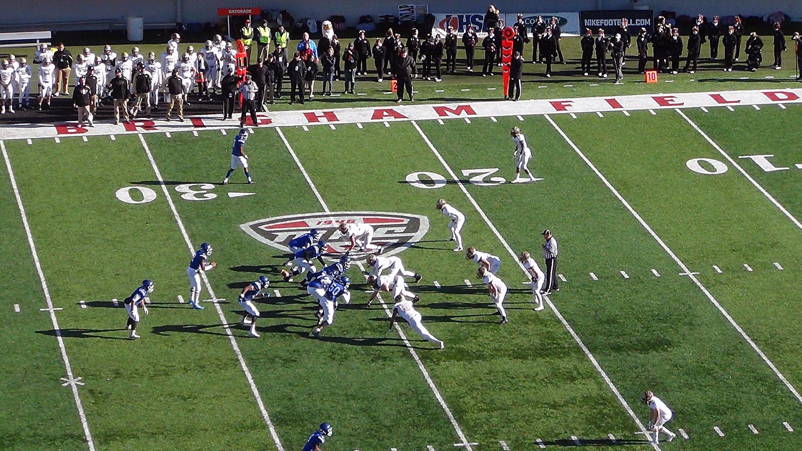 Elevated game film of a high school football game