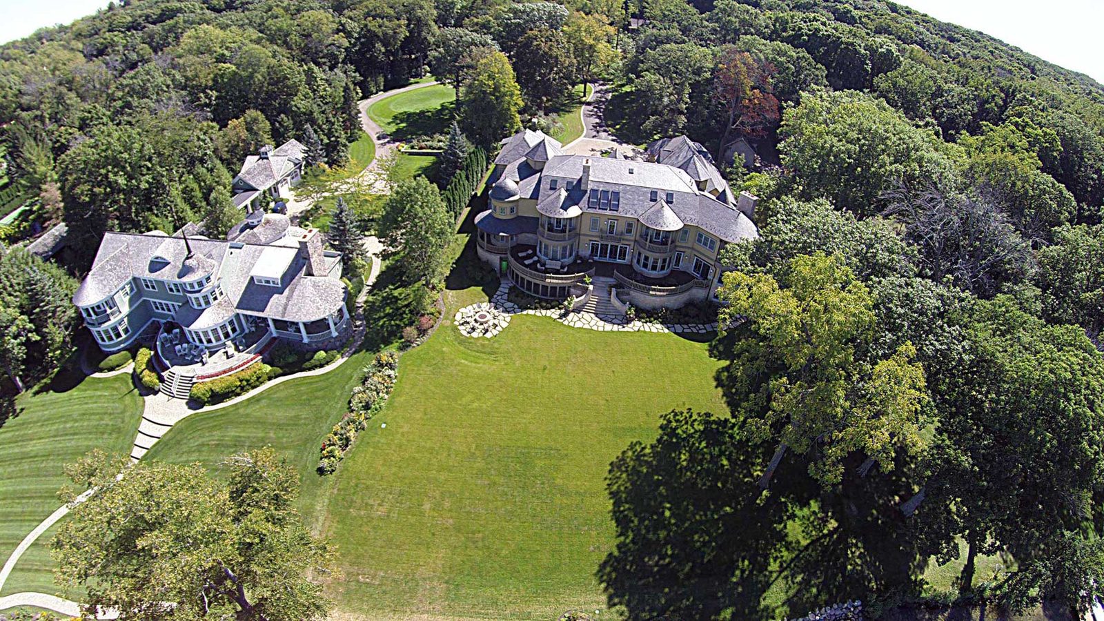 Aerial drone photography of a wooded estate